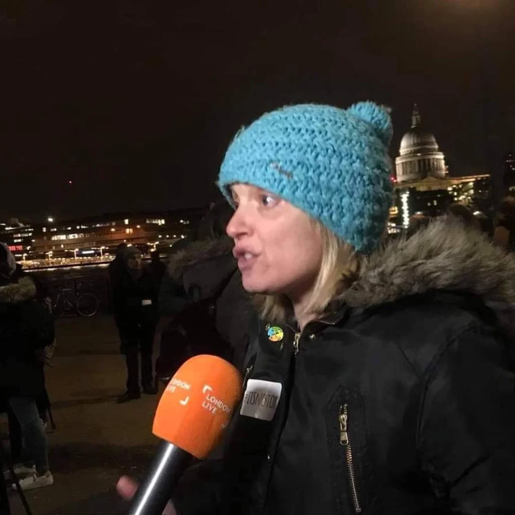 Chris Tuck outside with a reporter from London Live talking into a microphone